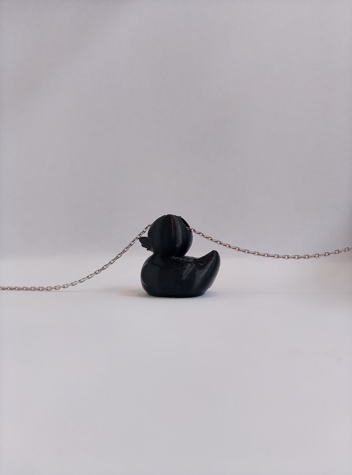 Who gives a duck necklace